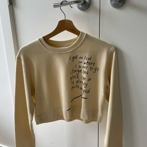 Rupi Kaur KOTN exclusive merch sweater